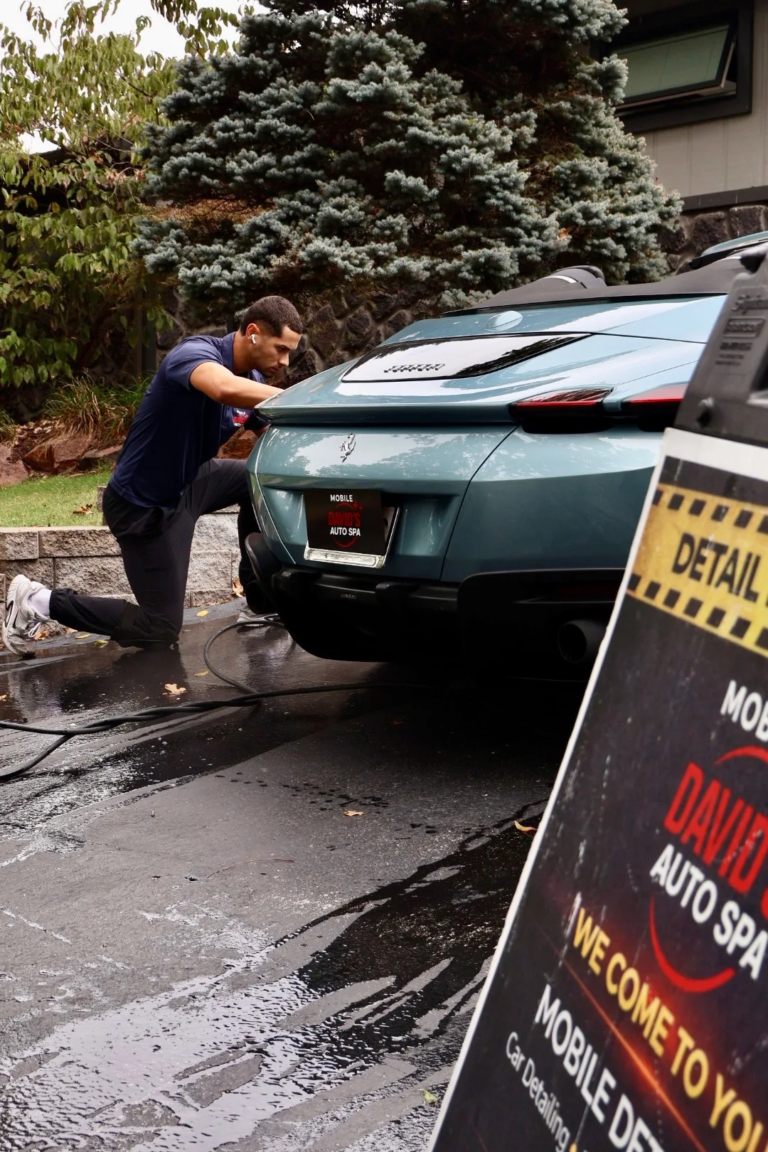 David's Auto Spa specialist caring for a Ferrari on location